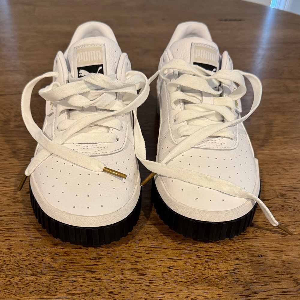 Puma Women's White Sneakers with Black Soles